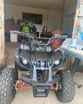 quad 125