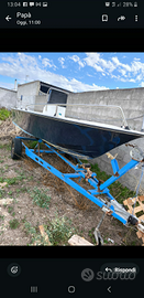 Barca con motore e carrello