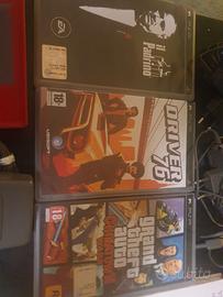Psp con giochi con caricatore e astuccio