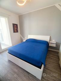 letto matrimoniale contenitore + comodini sospesi