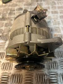 Alternatore con Depressore Pompa Vuoto 12V 70A Nis