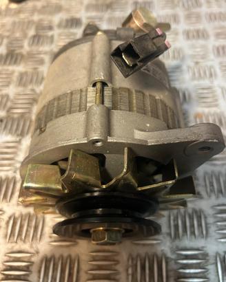 Alternatore con Depressore Pompa Vuoto 12V 70A Nis