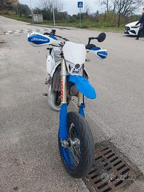 TM 125