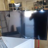 Tv Telefunken 32" con aste supprto