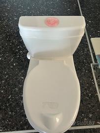 Vasino a forma di water con suono e luci