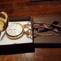 Orologio d’epoca Omega con catena in oro 18 carati