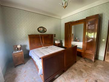 Camera da letto stile Impero