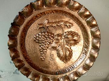Piatto in rame decorativo