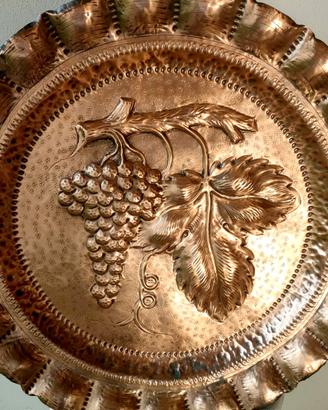 Piatto in rame decorativo