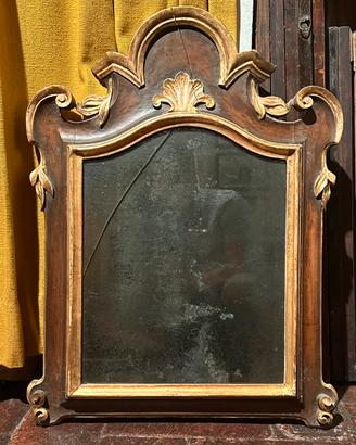Specchiera in legno intagliato e dorato