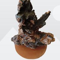 Scultura astratta in legno trattato