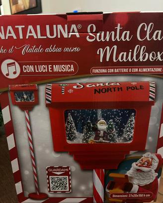 lampione di babbo natale con neve e musiche 