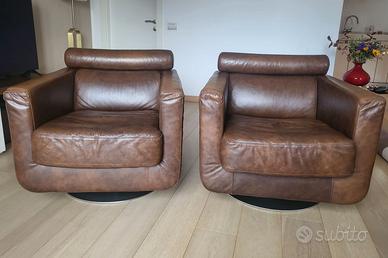 Coppia di poltrone in pelle