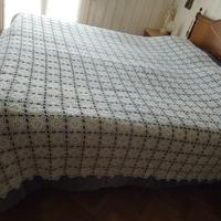 Coperta in pizzo fatta a mano.