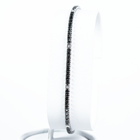 Tennis in oro con diamanti neri e bianchi