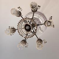 Lampadario a bracci in ferro battuto con pendenti