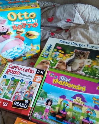 Giochi vari 500 barbie,carrello dotti peluches etc