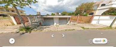 Locale con abitazione e giardino