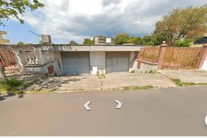 Locale con abitazione e giardino