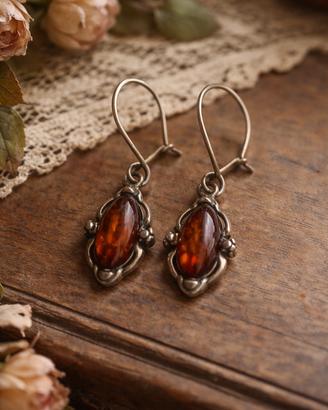 Antichi orecchini argento e ambra