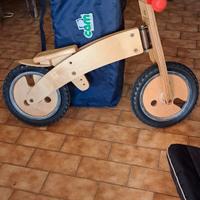 Bici di legno, giochi per la spiaggia e culla