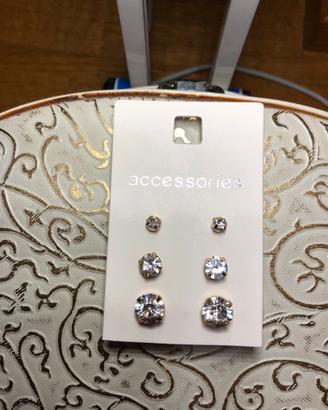 Orecchini punto luce