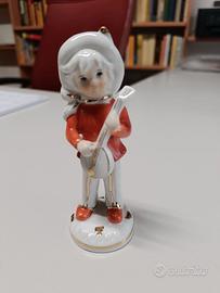 statuina "Bambino che suona il banjo"