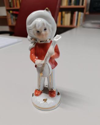 statuina "Bambino che suona il banjo"