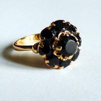 Anello oro 750 con granati 6,250 gr