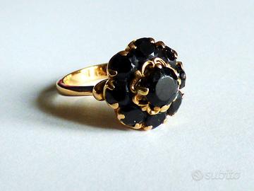 Anello oro 750 con granati 6,250 gr