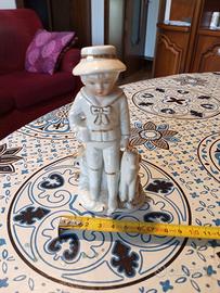 Statuetta Raffigurante Bambino con Cagnolino