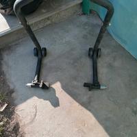 giacca, stivali, cavalletto moto