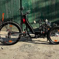 Triciclo con pedalata assistita