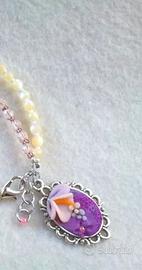 Bracciale madreperla, cristalli e ciondolo