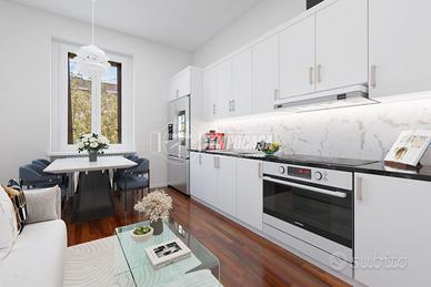 GRAZIOSO BILOCALE AL QUINTO PIANO CON ACCESSO OPZI