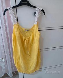 Top giallo a canotta con bretelle in pizzo