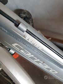 Bici uomo-donna con accessori e porta bici da auto