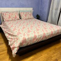 Letto futon contenitore wengé con testiera bianca