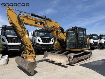 Escavatore Caterpillar 311D con martello benne pin