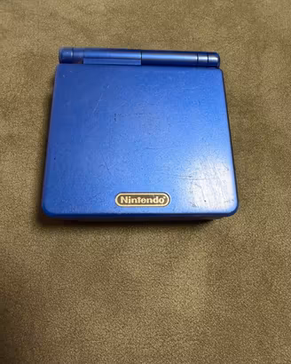 Game boy advance sp +  gioco Tomb Raider