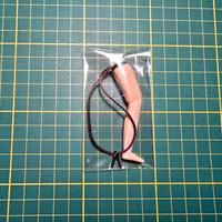 portachiavi Garpez Tre uomini e una gamba