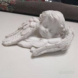 Angelo VINTAGE che dorme nelle ali