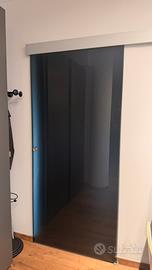 Porta scorrevole esterno muro in cristallo fumé