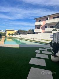 Appartamento Palau in residence con piscina