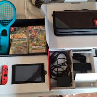 Nintendo switch + giochi custodia e accessori