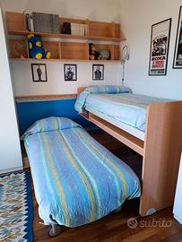 Arredamento Camera con letto a scomparsa