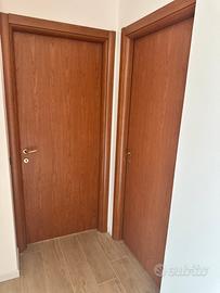 4 porte a battente + 1 a libro color ciliegio