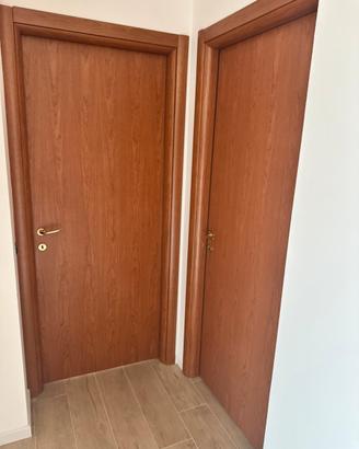 4 porte a battente + 1 a libro color ciliegio
