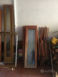 Due porte finestre,un'anta, una finestra in legno