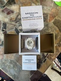 Omega Swatch Mission to Earthphase Moonshine Gold